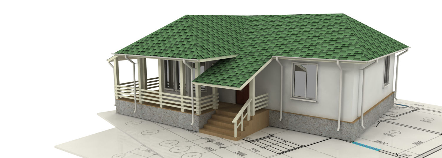 Miniature model of home design sitting atop blueprints
